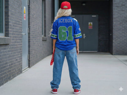 Person wearing a blue sports jersey with 'ICEBOX' and number '61', standing in an outdoor setting.