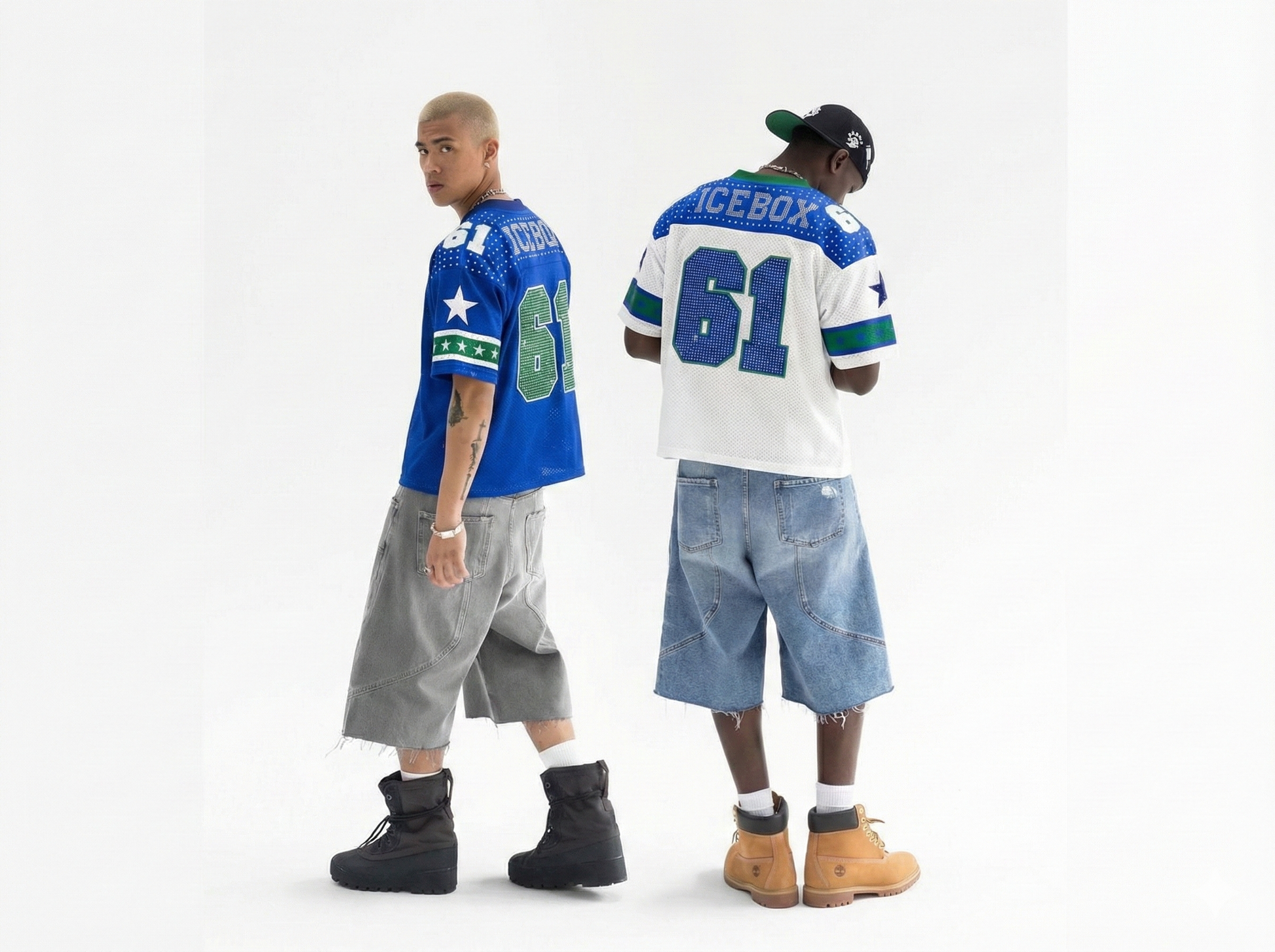 Two people wearing sports jerseys and shorts on a white background