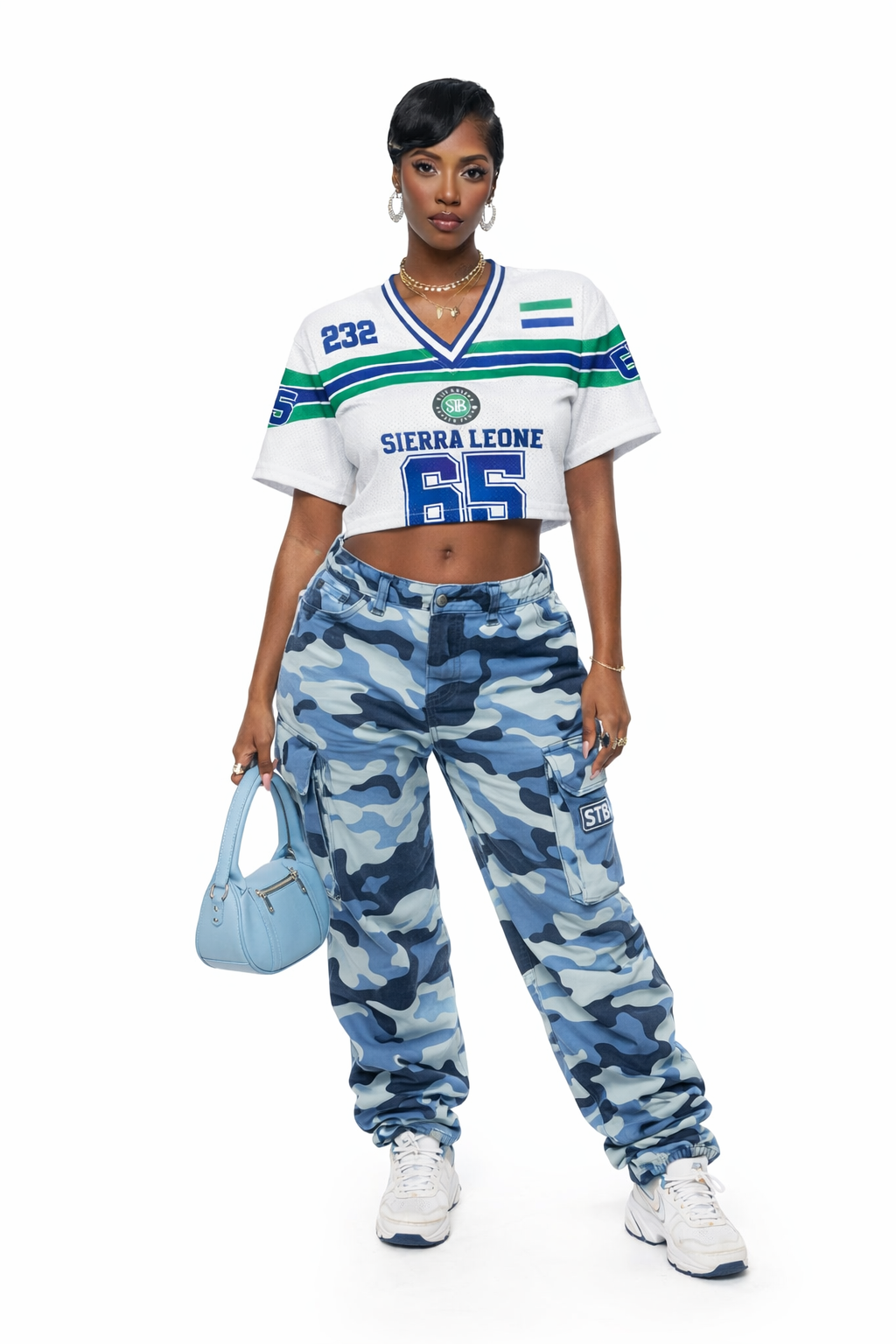 Female model in Sierra Leone cropped jersey 232, oversized streetwear crop top with camo pants