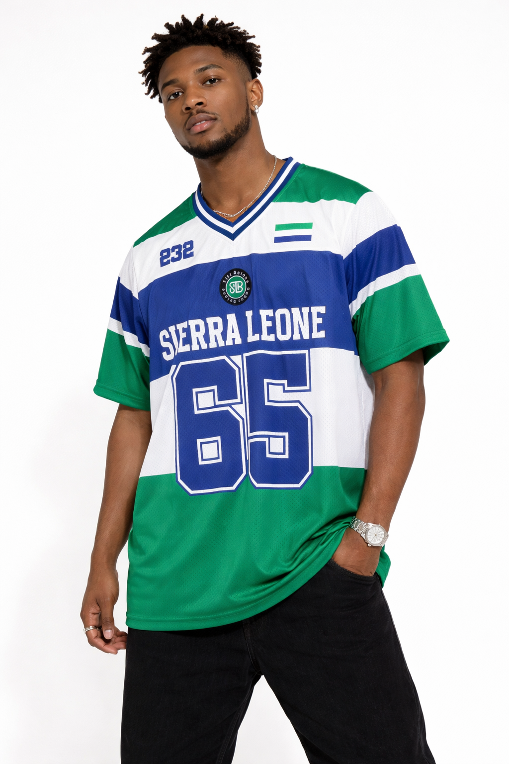 Man wearing a Sierra Leone sports jersey with green, blue, and white colors on a white background