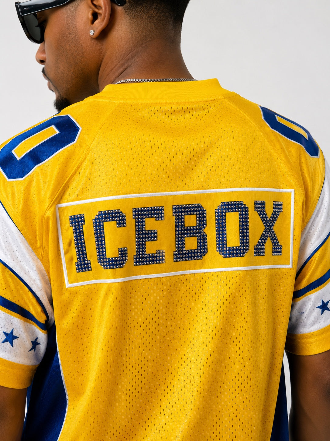 STB ICEBOX Yellow jersey close-up back view with ICEBOX rhinestone branding